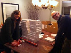 It's a Wrap: Patti Winegar and Larry Margolis, Managing Partners of SPM Marketing & Communications in LaGrange, IL put the finishing touches on best employee Christmas gift of the year--an iPad2 for all 40 employees.